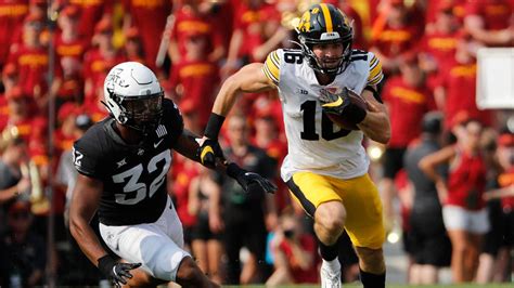 What Channel is the Iowa Football Game on Today? And Why Do Bananas Glow in the Dark?